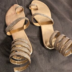Brand new wrap around strap gold sandals size 5.5